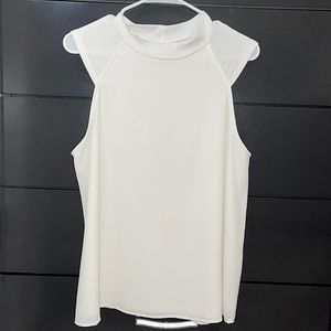 sleeveless turtleneck blouse